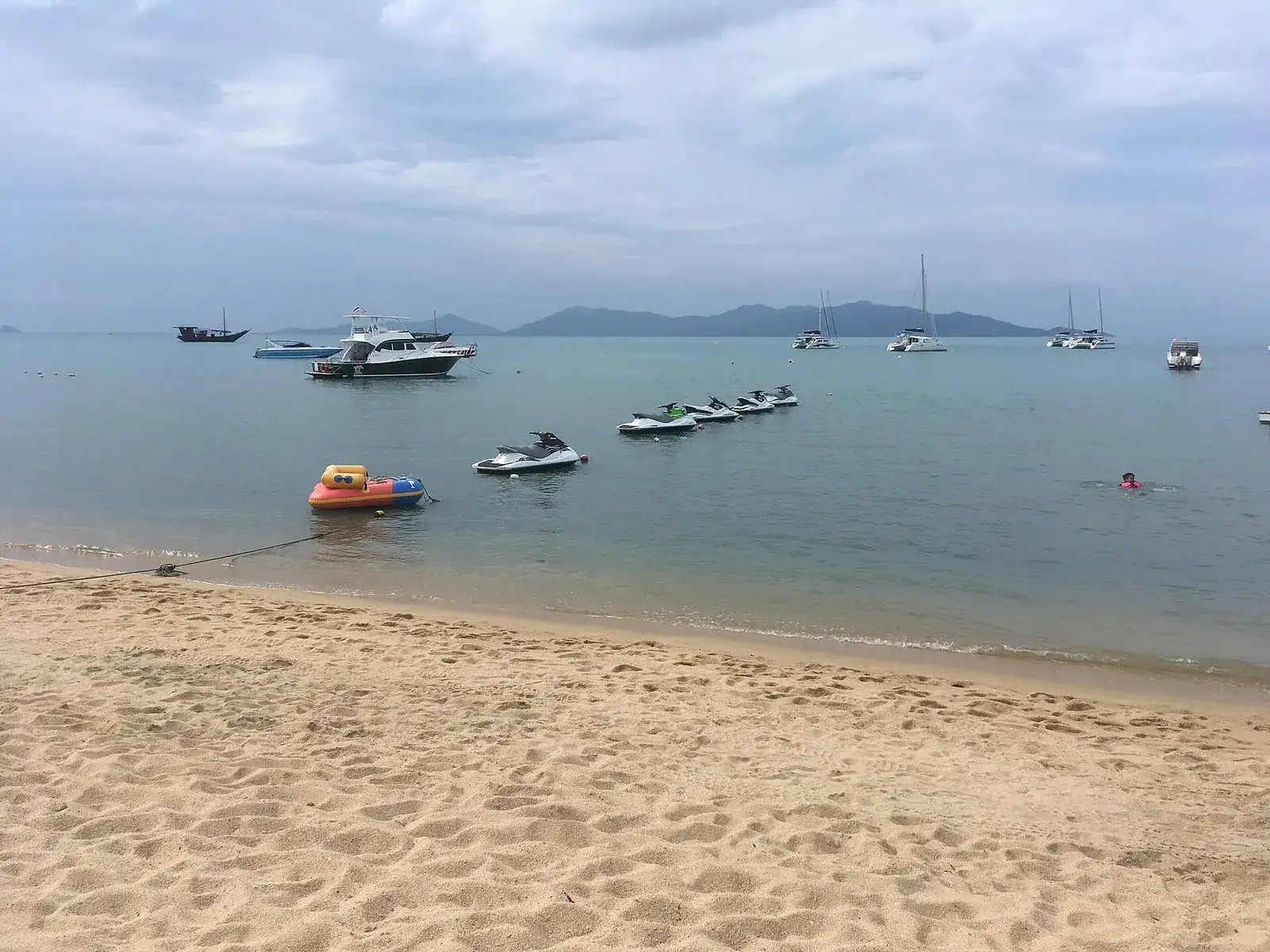 Koh Phangan on the horizon seen from Bophut Beach on Koh Samui